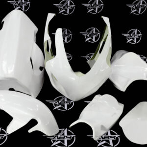 White motorcycle fairings on black background