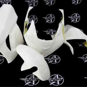 White motorcycle fairings on ABS background.