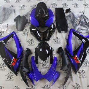 Blue black motorcycle fairing kit parts on display.