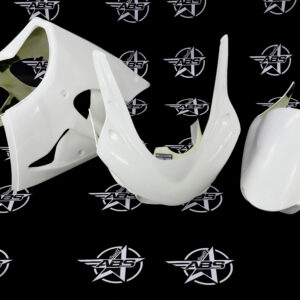 White motorcycle fairings on black ABS background.