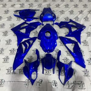 Blue motorcycle fairing kit on display