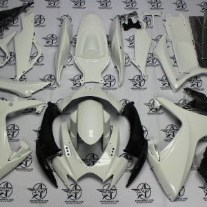 Motorcycle fairing parts on display.