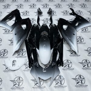 Black and white motorcycle fairing parts layout