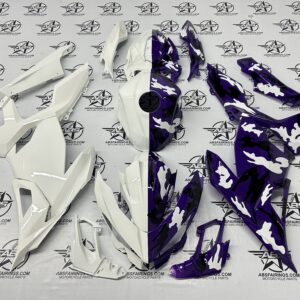 White and purple camouflage motorcycle fairings displayed.