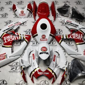 Motorcycle fairings with Lucky Strike and Motul branding.