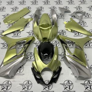 Green motorcycle fairings on ABS Fairings background.